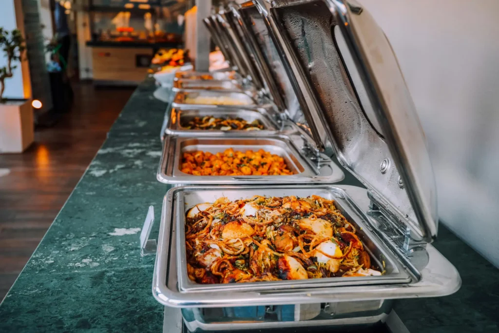 West African catering spread prepared by MayaMoyo Dishes